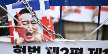 Plakat opozvanog predsednika Južne Koreje Jun Suk Jeola na protestu Foto Philip Fong AFP